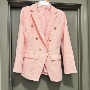 Woman’s pink jacket size medium